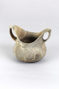 Ceașcă cu două toarte, Epoca bronzului